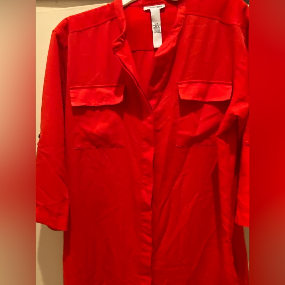 This is a Calvin Klein dress in red.